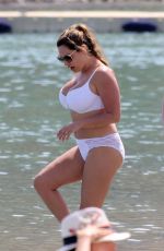 KELLY BROOK in White Bikini on the Beach in Mykonos 05/26/2018