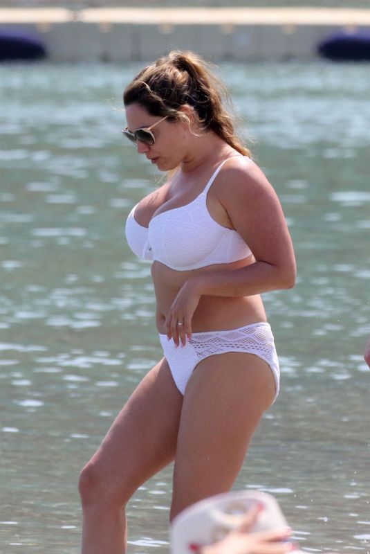 KELLY BROOK in White Bikini on the Beach in Mykonos 05/26/2018