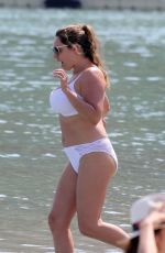 KELLY BROOK in White Bikini on the Beach in Mykonos 05/26/2018