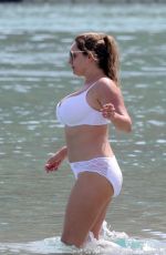 KELLY BROOK in White Bikini on the Beach in Mykonos 05/26/2018