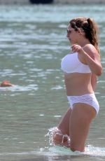 KELLY BROOK in White Bikini on the Beach in Mykonos 05/26/2018