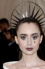 LILY COLLINS at MET Gala 2018 in New York 05/07/2018