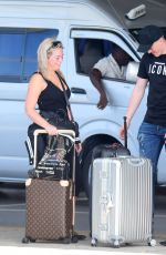 MEGAN DAVISON at Grantley Adams International Airport in Barbados 05/14/2018