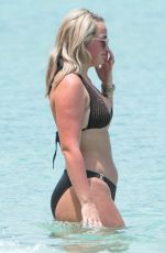 MEGAN DAVISON in Bikini at a Beach in Barbados 05/15/2018