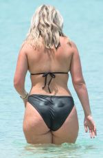 MEGAN DAVISON in Bikini at a Beach in Barbados 05/15/2018