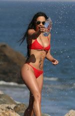 MELISSA RISO in Bikini for 138 Water at a Beach in Malibu 05/17/2018