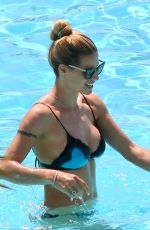 MICHELLE HUNZIKER in Bikini at a Swimming Pool in Monaco 05/19/2018