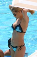 MICHELLE HUNZIKER in Bikini at a Swimming Pool in Monaco 05/19/2018