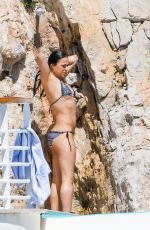 MICHELLE RODRIGUEZ in Bikini at Pool at Cap Eden Roc Hotel in Antibes 05/15/2018