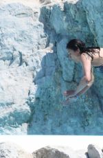 MICHELLE RODRIGUEZ in Bikini Swimming at Eden Roc Hotel in Antibes 05/17/2018