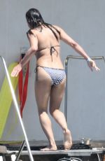 MICHELLE RODRIGUEZ in Bikini Swimming at Eden Roc Hotel in Antibes 05/17/2018