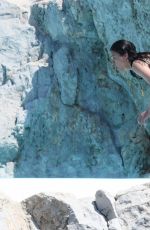 MICHELLE RODRIGUEZ in Bikini Swimming at Eden Roc Hotel in Antibes 05/17/2018