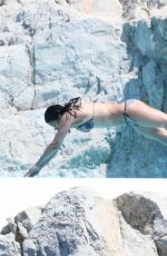 MICHELLE RODRIGUEZ in Bikini Swimming at Eden Roc Hotel in Antibes 05/17/2018
