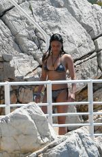 MICHELLE RODRIGUEZ in Bikini Swimming at Eden Roc Hotel in Antibes 05/17/2018