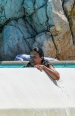 MICHELLE RODRIGUEZ in Bikini Swimming at Eden Roc Hotel in Antibes 05/17/2018