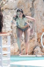 MICHELLE RODRIGUEZ in Bikini Swimming at Eden Roc Hotel in Antibes 05/17/2018