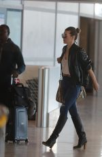 MILLA JOVOVICH at Roissy Airport in Paris 05/19/2018