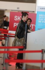 MILLA JOVOVICH at Roissy Airport in Paris 05/19/2018