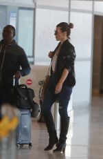 MILLA JOVOVICH at Roissy Airport in Paris 05/19/2018