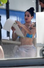 NIKKI BELLA in Bikini on the Set of Total Divas at a Pool in Miami 05/30/2018