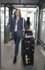 SUKI WATERHOUSE at Heathrow Airport in London 05/06/2018