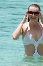 ZOE SALMON in Swimsuit at a Beach in Barbados 04/05/2018