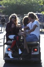 ABIGAIL ABBEY CLANCY and Peter Crouch at Golf Cart at Isle of Wight Festival 06/22/2018
