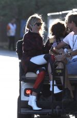 ABIGAIL ABBEY CLANCY and Peter Crouch at Golf Cart at Isle of Wight Festival 06/22/2018