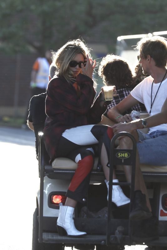 ABIGAIL ABBEY CLANCY and Peter Crouch at Golf Cart at Isle of Wight Festival 06/22/2018