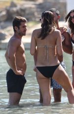 AMY JACKSON and KINBERLEY GARNER in Bikinis at a Beach in Mykonos 06/13/2018