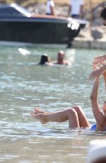 AMY JACKSON and KINBERLEY GARNER in Bikinis at a Beach in Mykonos 06/13/2018