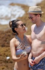 ANNA SHARYPOVA in Bikini and Andre Schurrle at a Beach in Tulum 05/28/2018
