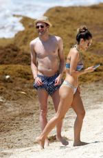 ANNA SHARYPOVA in Bikini and Andre Schurrle at a Beach in Tulum 05/28/2018