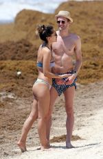 ANNA SHARYPOVA in Bikini and Andre Schurrle at a Beach in Tulum 05/28/2018