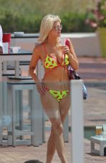 ASHLEY JAMES in Bikini on Holiday in Ibiza 06/07/2018