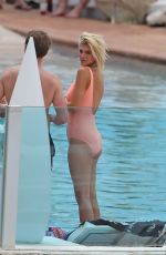ASHLEY JAMES in Swimsuit at a Pool in Ibiza 06/06/2018