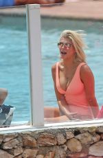 ASHLEY JAMES in Swimsuit at a Pool in Ibiza 06/06/2018