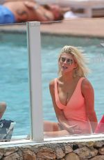 ASHLEY JAMES in Swimsuit at a Pool in Ibiza 06/06/2018