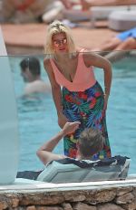 ASHLEY JAMES in Swimsuit at a Pool in Ibiza 06/06/2018