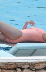 ASHLEY JAMES in Swimsuit at a Pool in Ibiza 06/06/2018