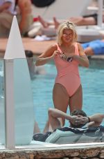 ASHLEY JAMES in Swimsuit at a Pool in Ibiza 06/06/2018