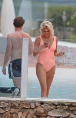 ASHLEY JAMES in Swimsuit at a Pool in Ibiza 06/06/2018