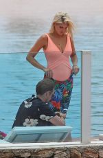 ASHLEY JAMES in Swimsuit at a Pool in Ibiza 06/06/2018