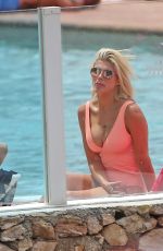 ASHLEY JAMES in Swimsuit at a Pool in Ibiza 06/06/2018