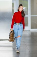 BELLA HADID in Ripped Jeans at JFK Airport in New York 06/02/2018
