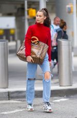 BELLA HADID in Ripped Jeans at JFK Airport in New York 06/02/2018
