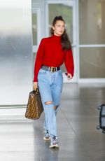 BELLA HADID in Ripped Jeans at JFK Airport in New York 06/02/2018