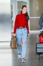 BELLA HADID in Ripped Jeans at JFK Airport in New York 06/02/2018