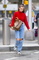 BELLA HADID in Ripped Jeans at JFK Airport in New York 06/02/2018