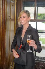 CHARLIZE THERON at Crystal of Hope 2018 Outreach Project in Vienna 05/31/2018